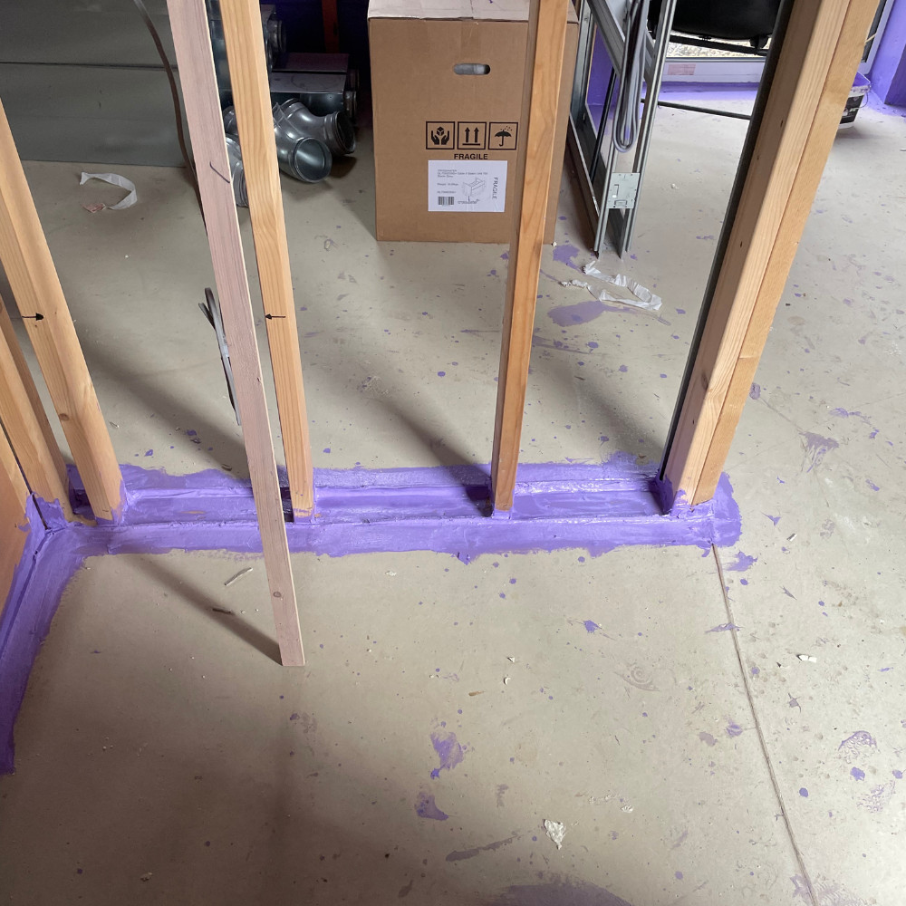 Close-up of airtight detailing using Passive Purple Brush on joints and junctions.